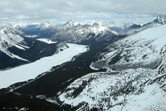 39 Goat Range, Spray Lake, Mount Rundle, Three Sisters Faith Peak, The Rimwall, Windtower, Mount Lougheed From Helicopter Between Mount Assiniboine And Canmore In Winter.jpg